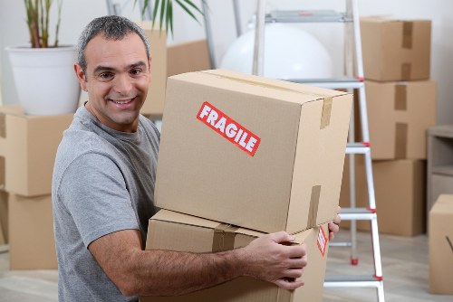 Professional team loading furniture into a truck