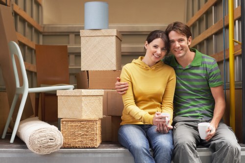 Stacked moving boxes in a stylish Chelsea street setting