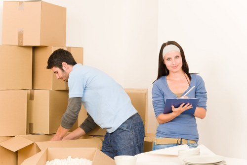 Professional movers handling furniture in Chelsea